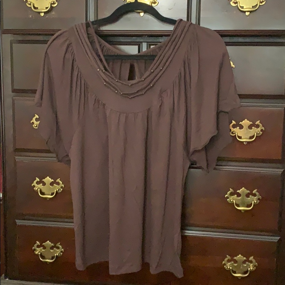 Adorable brown blouse w/ detail on front.